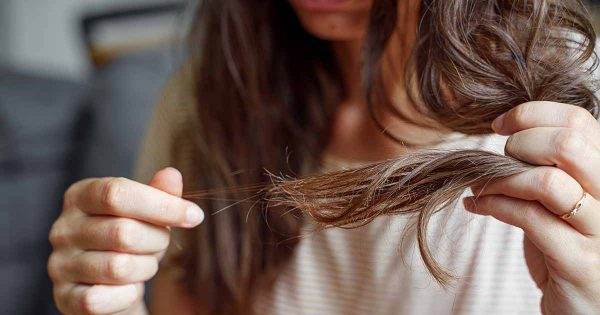 woman losing her hair