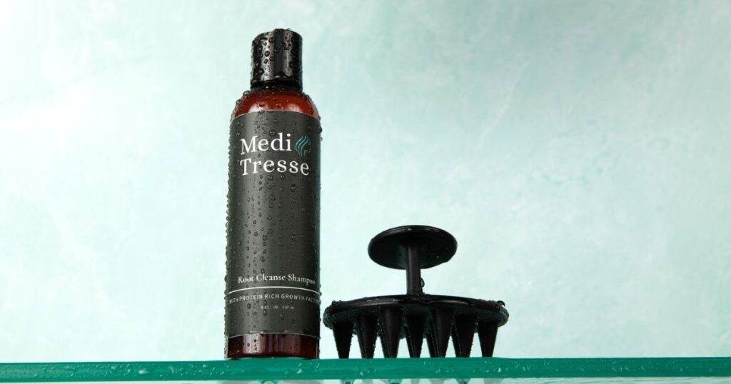 a photo of Scalp Root Cleanse Shampoo and Scalp Massager are top in-home hair loss products by MediTresse.