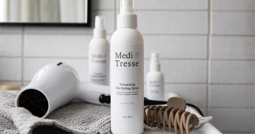 a photo of Volumizing Pre-Styling Spray are top in-home hair loss products by MediTresse.